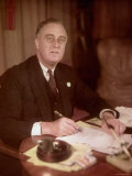 Oscar Jordan's of President Franklin Roosevelt Poised, Pen to Paper, Working at His Desk