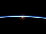 The Thin Line of Earth's Atmosphere and the Setting Sun
